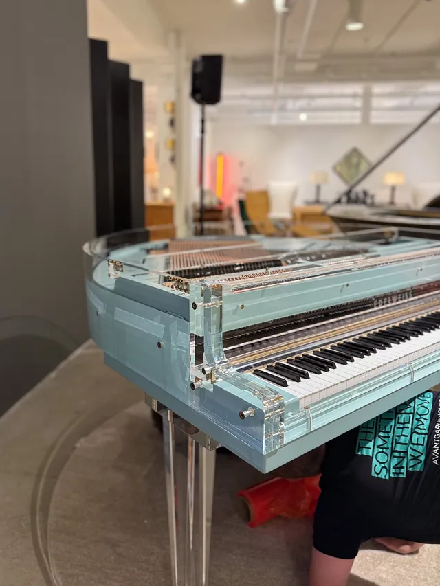 Professional piano movers safely transporting piano in NYC