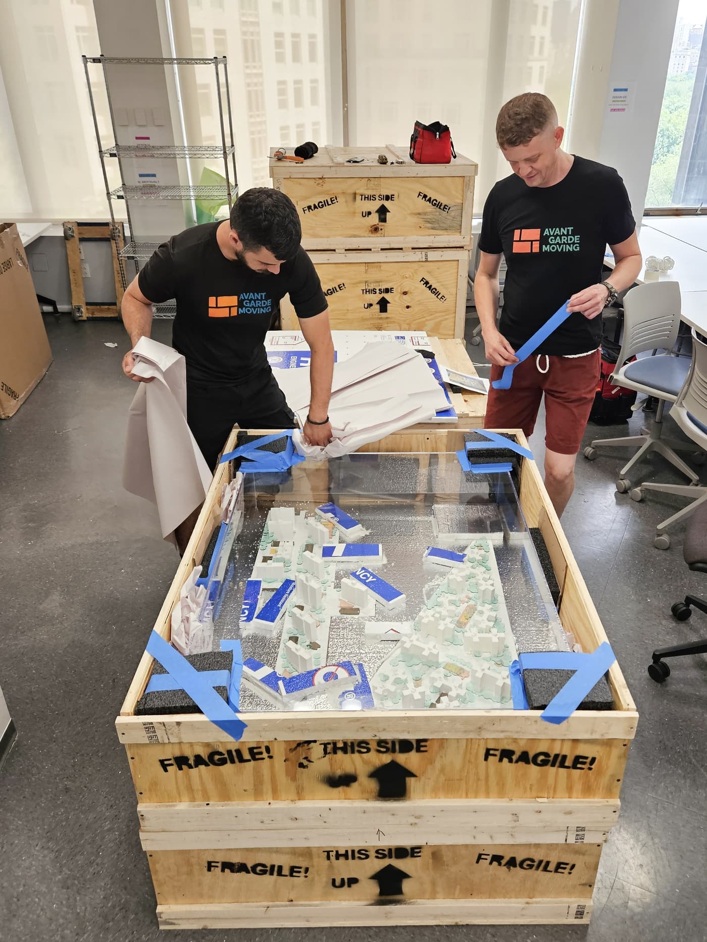 Professional event and corporate project movers handling equipment and displays